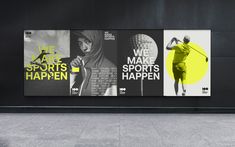 an advertisement on the side of a building for sports apparels and accessories, with a man walking past it