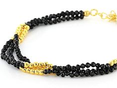 2mm round black spinel, 18k yellow gold over sterling silver 2mm bead, 3-strand bracelet. Measures approximately .30"W. Lobster claw clasp with a 1" extender. Gold Double Strand Bracelets With Faceted Beads, Gold Double Strand Bracelet With Faceted Beads, Spinel Gemstone, Broken Chain, Pearl Strands, Latest Jewellery, Black Spinel, Strand Bracelet, Faceted Gemstones