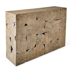 a large wooden block with holes in it