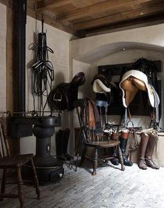 there are many hats and boots in this room