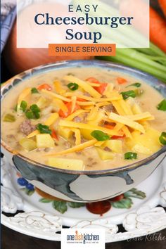 Enjoy a rich and creamy single serving cheeseburger soup made with ground beef, fresh vegetables, and cheddar cheese. Ready in 30 minutes! | One Dish Kitchen Soup For One, Cheese Burger Soup Recipes, Spiced Drinks, Baked Potato Casserole, Cheeseburger Soup, Ground Meat Recipes, Sandwiches For Lunch