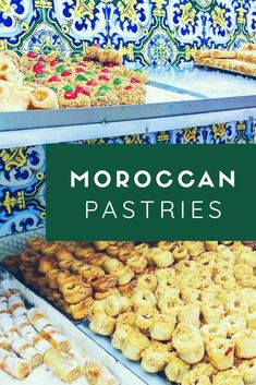 many different pastries are on display in a store with the words moroccan pastries above them