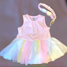 Your Adorable Tutu Dress Perfect For Easter And Spring Pink Sleeveless Tutu Dress For Playtime, Sleeveless Pink Tutu Dress For Playtime, Cute Sleeveless Tutu Dress For Playtime, Spring Pink Tutu Dress For Playtime, Pink Tutu Dress For Playtime In Spring, Pink Tutu Dress For Spring Playtime, Summer Cotton Tutu Dress For Playtime, Cotton Tutu Dress For Playtime In Summer, Playful Tutu Dress For Spring Play