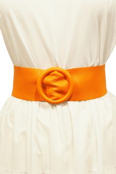 This Italian leather belt is the perfect accessory to add a classic touch to any dress. Embellished with an elegant circular buckle, it's a bold way to show off any dress in style. Let your fashion statement shine with this thick and timeless belt. Please note that since leather is a natural material, each belt can have slight color, texture, grain and size variations. The belt is 43 inches (110 cm) long, 2 1/2 inches (6 cm) wide next to the buckle and 3 inches (8 cm) at the end.  Made in Florence from 100% Italian leather. Belt For Dresses, Orange Belt, Woman Belt, Orange Scarf, Italian Women, Weird Fashion, Orange Leather, Suspender Belt, Wide Belt