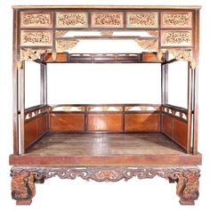 This is a wonderful example of a canopy bed from Shanghai Province, China. Made of Chinese Northern Elm, this bed features hoofed feet and multiple floral carvings. The exterior is heavily decorated with gold leafing, carvings, ornate carved figurine pillars, and delicate fretwork. The interior features eight, hand-painted, ornately designed panels, a woven reed bed/mattress platform, and a low chest with two drawers on each side. Chinese Bed, Deck Canopy, Wedding Bed, Backyard Canopy, Wedding Canopy, Diy Canopy, Door Canopy, White Canopy, Fabric Canopy