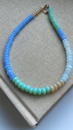 Calm Waters Gemstone Necklace – Erin McDermott Jewelry Turquoise Aquamarine Gemstone Beads Necklace, Turquoise Multi-strand Gemstone Necklace, Multi-strand Turquoise Gemstone Beads Necklace, Make A Color Palette, Blue Multi-strand Gemstone Necklaces, Elegant Turquoise Multi-stone Necklaces, Calm Waters, Boutique Accessories, Calm Water