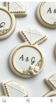 decorated cookies with the names and date on them are arranged in rows against a white background