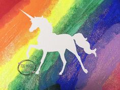 the silhouette of a unicorn on a rainbow painted background