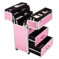 Stackable makeup train case contains 6 top extendable pull-out drawers (each dividable into 2 parts), 1 middlebox, and 2 bottom drawers (both dividable into 3 parts) for numerous storage options. A high-quality aluminum frame with reinforced steel corners makes it a durable travel choice. Lock and keys are included for worry-free safekeeping. A sturdy adjustable handle offers a convenient way to transport all your makeup at once. Sturdy aluminum alloy frame. Color: Pink. Makeup Suitcase, Pink Wheels, Rolling Makeup Case, Jewelry Organizer Drawer, Makeup Stand, Cosmetic Train Case, Storage Trolley, Makeup Train Case, Train Case