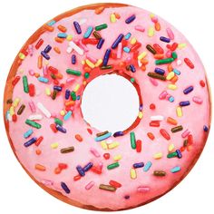 a donut with pink frosting and sprinkles on it's side