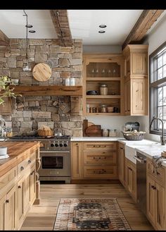 a kitchen filled with lots of wooden cabinets and counter top space next to a window