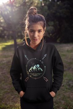 This super-soft hoodie features a rainbow mountain, river, and moon graphic on it and is perfect for humans who love to go on adventures, camping, hiking, or just love to explore! Wear this hoodie all year long! It makes a wonderful gift for that wanderlust in your life! 🌎 -------------------------------------------  G I L D E N . H O O D I E  ------------------------------------------- * 50% cotton, 50% polyester * Air jet yarn for a softer feel and reduced pilling * Double-lined hood with color-matched drawcord * Double-needle stitching at shoulder, armhole, neck, waistband, and cuffs * Preshrunk fleece knit * Pouch pocket * Tear away label 🔴 Images are printed on the shirt using DTG, Direct to Garment, meaning the ink is sunk into the fabric, unlike vinyl which sits on top of the fabr Sun Hoodie, Nature Hoodie, Forest Clothes, Travel Hoodie, Comfortable Hoodies, Yoga Hoodie, Rainbow Mountain, Adventure Hiking, Life Map