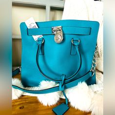 Nwt Authentic Michael Kors Large Leather Aqua Hamilton Tote With Silver Hardware! Absolutely Stunning! Gorgeous Aqua Color!! I Bought At Macys And Never Carried. Excellent Shipper And Quick Rater. Designer Soft Leather Blue Bags, Designer Blue Soft Leather Bags, Light Blue Leather Bag With Branded Hardware, Luxury Blue Michael Kors Shoulder Bag, Michael Kors Blue Bag With Branded Hardware, Elegant Michael Kors Blue Bag, Blue Leather Michael Kors Bag, Blue Tote Shoulder Bag With Silver-tone Hardware, Aqua Color