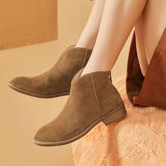 This ankle boot is fashioned with a V-shaped high-top design, making your legs look more slender. Back zip closure is easier to wear/ take off. Rubber outsole with a flat heel is also comfortable to walk around. Ankle Boots For Women, Saddle Brown, Pig Skin, Boots For Women, Top Design, Suede Ankle Boots, Rubber Heels, V Shape, Ankle Booties