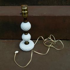 Vintage hobnail milk glass table or desk lamp . Lamp features 3 tiers of hobnail milk glass separated by metal columns. Made in the 1950s. Metal Columns, Glass Table Lamp, The 1950s, Glass Table, Milk Glass, Desk Lamp, Table Lamp, Milk, Desk