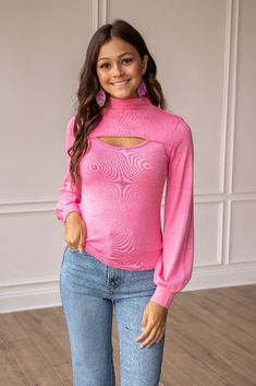 Pair it with high-waisted jeans or a skirt for a balanced look that showcases the top's unique details. Let this top become your expression of individuality, allowing you to embrace both the subtlety of pink and the boldness of cut-outs in a single, striking piece.Model & Fit Model: Elena (5' 8" and Size 6 or S) is wearing a size small. Fitted & Flattering Stretch: 60% Not lined Semi-stretch Turtle Neck Fabric & Care Material:96%Polyester 4% Spandex Care Instructions: Wash Cold, Dry Flat Materia