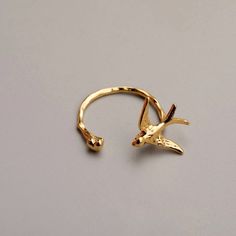 Inspired by Oscar Wilde‘s story “The Happy Prince”. To the one who always helps others. Bronze with 18K gold plated. Anti tarnish, shower safe. Gold Plated Midi Rings As Gift, Gold Brass Midi Rings As Gift, Happy Prince, The Happy Prince, Bird Ring, Bird Rings, Diamond Bar, Oscar Wilde, Open Ring