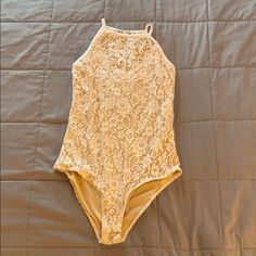 Lace With Cream Lining And High Neck. Size Medium. Never Worn! Excellent Condition Sleeveless Lace Bodysuit For Spring, Summer Lace Bodysuit For Night Out, Lace Bodysuit, Lace Tops, High Neck, Womens Tops, Size Medium, Cream, Lace