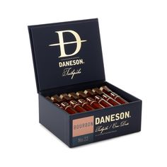 an open box of daniels bourbons on a white background