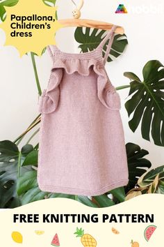 a pink knitted dress hanging on a wooden hanger with text overlay that says free knitting pattern