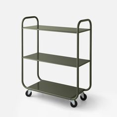 a green cart with three shelves and wheels on the bottom, one shelf is empty