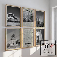 four black and white photographs hang on the wall in front of a window with text overlaying them