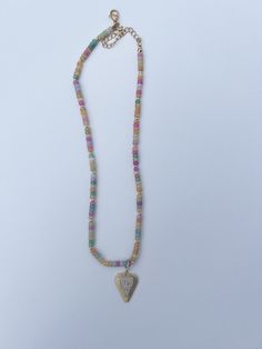 Add a pop of color to your outfit with our Rainbow Necklace Luxe- Easy Does It! This on trend necklace stack features vibrant gemstones, making it a best seller with five stars. Stand out and be the envy of others with this playful and stylish piece. Product Details: 16" lobster claw 2" extender charm not included Trendy Crystal Necklace With Beaded Chain, Trendy Multicolor Jewelry With Natural Stones, Trendy Multicolor Charm Necklace With Lobster Clasp, Trendy Colorful Jewelry With Heart Beads, Trendy Rainbow Necklace With Heart Beads, Trendy Rainbow Necklaces With Heart Beads, Rainbow Beaded Chain Necklace Trendy Style, Trendy Rainbow Beaded Chain Necklace, Multicolor Heart Beads Pendant Necklace