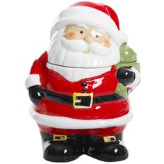 a ceramic santa clause figurine holding a green item in his right hand, on a white background