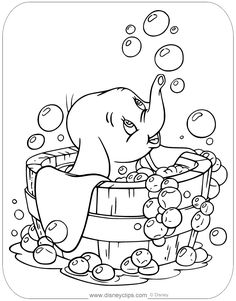 an elephant taking a bubble bath in a tub with bubbles on the water and bubbles coming out