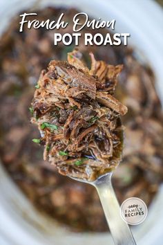 a spoon full of french onion pot roast on a white plate with the title above it