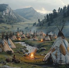 a group of teepees sitting on top of a lush green hillside next to a river