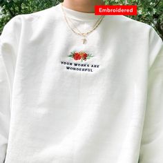 "💐 \"Your works are wonderful\" embroidered on a comfy cute crewneck. If you're on the lookout for both style and comfort, this fleece sweatshirt is the perfect choice. And with up to 5% recycled polyester in components, you'll be taking a little step closer to a more earth-friendly way of life. *SIZES ARE UNISEX * 50% cotton, 50% polyester (up to 5% recycled polyester, made from plastic bottles) * Fabric weight: 7.8 oz/y² (264.5 g/m²) * Patented low-pill, high-stitch density PrintPro® XP fleec Embroidered Crew Neck Sweatshirt For Everyday, Everyday Embroidered Long Sleeve Sweatshirt, Embroidered Long Sleeve Sweatshirt, Embroidered Long Sleeve Sweatshirt For Everyday, Trendy Oversized Embroidered Sweatshirt, Embroidered Winter Sweatshirt For Everyday, White Floral Embroidered Sweatshirt For Fall, Fall Sweatshirt With Embroidered Graphics For Everyday, Crew Neck Sweatshirt With Floral Embroidery