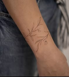 a person with a tattoo on their arm