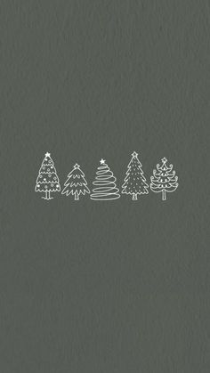 christmas trees are lined up against a gray background with white ink on the bottom and bottom