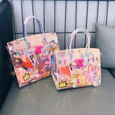 Medium Pink Floral Holographic Satchel Handbags Shoulder Clear Purse for $78.00 | Baginning Pink Holographic Purse, Cheap Polyurethane Shoulder Bag, Colorful Party Bags For Summer, Playful Multicolor Spring Bags, Trendy Pink Bags With Graphic Print, Playful Red Summer Bags, Multicolor Plastic Bags As Gift, Multicolor Plastic Travel Bag, Colorful Summer Bags For Gifts