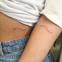 a woman's stomach with the words love and laughter written on it, in cursive font