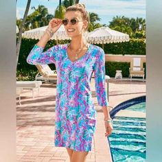 Lily Pulitzer Tessa Dress Seaweed Samba Size Xxs New With Tags Effortlessly Colorful In Printed Supima Cotton Jersey, The Tessa Dress Is An Everyday Essential. This Straight Fit T-Shirt Dress Features A Classic V-Neckline And 3/4 Length Sleeves. Measurements Laying Flat: Armpit To Armpit 17 Inches Waist 15 Inches Shoulder To Hem 35 Inches Pink V-neck Poolside Dress, Blue Long Sleeve Dress For Poolside, Blue Long Sleeve Poolside Dress, Pink Tropical Dress For Poolside, Pink Tropical Dresses For Poolside, Pink Floral Print Dress For Poolside, Lilly Pulitzer Maxi Dress, Pool Dress, Blue Lily