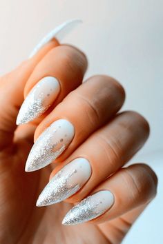 Explore trendy white nails that feature cute designs, short styles, and milky finishes. Add bold black accents or keep it simple for a timeless look in 2025. Save this pin for the ultimate inspo! White Christmas Nails, White Glitter Nails, Holiday Nail Designs, Christmas Glitter, Winter Nail Art, Winter Nail Designs, Nail Designs Glitter, Festival Nails, Minimalist Nails