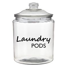 a glass jar with the words laundry pods written on it