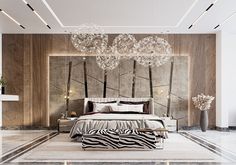 a bedroom with a zebra print bed and chandelier