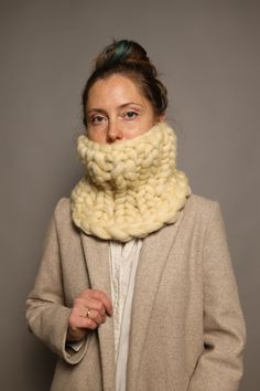 This hand knitted neck warmer is the warmest and coziest scarf you have ever had! Perfect for cold and windy days. All our knitted scarves and hats are made from natural merino wool. It's a very warm and soft material just perfect for the skin, you will be pleasantly surprised by your purchase! There is an Ivory color scarf in the pictures.  The length of the scarf is 45cm (around the neck) and the width is 20 cm. Available to order a set of knitted hat and scarf just for 95$ - a better price than separate items. ORDER DETAILS - Usually, it takes 2-3 days to knit and ship the scarf. - Any scarf is available in more than 20 different colors! - Don't hesitate to contact us :) My grandma will be happy to make a special winter gift for people you love! WASHING Hand clean only. Use liquid deter White Wool Scarves For Winter, White Wool Scarf For Winter, Cozy Hand Knitted Scarves, Cozy Hand-knitted Alpaca Scarves, Hand Knitted Cozy Scarf For Winter, Cozy Hand Knitted Yarn Scarves, Cozy Hand-knitted Scarves, Cozy Handmade Yarn Scarf, Cozy Crochet Scarves For Cold Weather