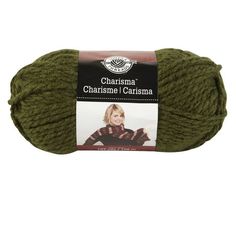 a ball of yarn with the label charishae carisma in green and red