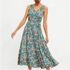 Nwot Loft Floral Godet Double V Midi Dress Colorful Flowy - Size S - New With Out Tags! In New Condition - Colors: Greens, Pinks, Yellows, Oranges, Blues - Godet Pleats Help To Make This Flowy Tie Waist Dress Extra Pretty - V-Neck Front And Back - Sleeveless - Removable Waist Tie - Swing Fit - Loose And Swingy - Midi - Hits At Mid-Calf - Pullover Style - Not Lined Lags: Flowy, Floral, Colortul, Tun, Swing, Loose, Midi, Cool, Summer, Spring, Transition, V-Neck, Godet Pleats, Pixie, Fairy, Fairyco Flowy Multicolor Sleeveless Dress For Spring, Pink Flowy Sleeveless V-neck Dress, Flowy Multicolor Floral Print Sleeveless Dress, Casual Multicolor Sleeveless Dress For Garden Party, Multicolor Maxi Sleeveless Dress For Garden Party, Multicolor Sleeveless Maxi Dress For Garden Party, Multicolor Sleeveless Sundress For Brunch, Green Bohemian Sleeveless Dress For Spring, Pink Flowy Sleeveless Dress With Floral Print