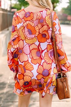 We are absolutely all about this bold floral dress! Those colors all look so good together! We love the flowy fit of this dress as well! This dress is going to look great with some dramatic tall boots this fall! 
Split v-neck
Long bubble sleeves
Bold floral print
No stretch
Baileigh is wearing the small. Purple Floral Dress, Bold Floral Print, Mint Julep Boutique, Mint Julep, Model Fits, Tall Boots, Purple Floral, Floral Dress, Dress Length