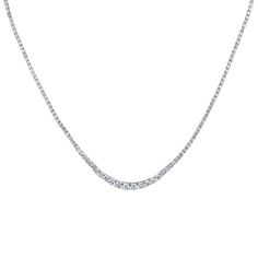 A luxury jewelry piece, this necklace from the REEDS Exclusive ECONIC Diamond collection will add sophisticated sparkle to your neckline. Crafted in 14k white gold, this luscious tennis necklace features 183 twinkling round lab grown diamonds. The lab grown diamonds are 5ctw, H in color and VS2 in clarity. The necklace is 17 inches in length and is secured with a box clasp. REEDS exclusive ECONIC Diamonds are lab grown in a technologically advanced facility, allowing us to offer laboratory creat Luxury Lab-grown Diamond Tennis Necklace Gift, Dazzling Diamond White Single Strand Tennis Necklace, Platinum Diamond Cut Tennis Necklace, Dazzling Platinum Tennis Necklace With Brilliant Cut, Dazzling Brilliant-cut Platinum Tennis Necklace, Fine Jewelry Platinum Tennis Necklace With Brilliant Cut, Anniversary White Gold Single Strand Tennis Necklace, White Gold Single Strand Tennis Necklace For Anniversary, Platinum Tennis Necklace