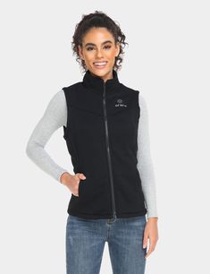 Crafted with an ultra-soft fleece liner and equipped with 3 carbon fiber heating elements. This fleece vest can be used over a long-sleeved shirt on chilly fall days or layered under a jacket for cold commutes and epic ski days. Machine washable. Heated Vest, Heated Clothing, Vest For Women, Fall Days, Fleece Vest, Body Size, Neck Collar, Hip Length, Puma Jacket