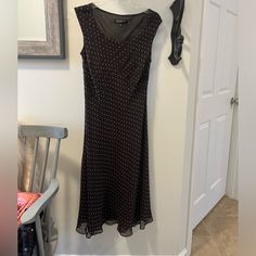 Feminine Sleeveless Scoop Neckline A Line Dress Dark Brown Polka Dotted 100% Silk Shell With 100% Polyester Lining Size 8p Never Wore, With Tags Approximate Measurements Length : 45.5” Pit To Pit: 20” Brown Polka Dots, New York Dresses, York Dress, Line Dress, Measurement Length, Jones New York, Scoop Neckline, A Line Dress, Dark Brown