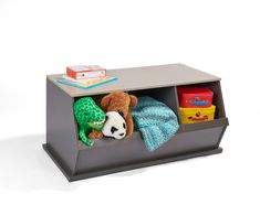 stuffed animals and books in a toy storage unit