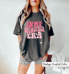 In My Godmother Era Shirt - Godmother T-Shirt - Mothers Day Shirt - Godmother Lovers T-Shirt - Gift For Godmother - Godmother Era Shirt How can I order? 1️) Please review all the information provided before placing an order 2️) Select the shirt type and size. 3️) Select the color of the shirt using the following options. 4️) Need more Items? Add the current item in the cart. And If you like to add more items to your order please press the back button and repeat steps 1-4 again. 5️) Once all your Godmother Shirt Ideas, Gift For Godmother, Godmother Shirts, Mother Shirts, Godmother Gifts, Baby Announcements, Comfy Shirts, God Parents, Mothers Day Shirts