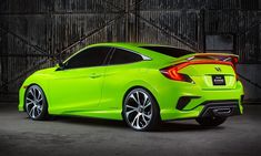 the rear end of a lime colored honda civic hatchback